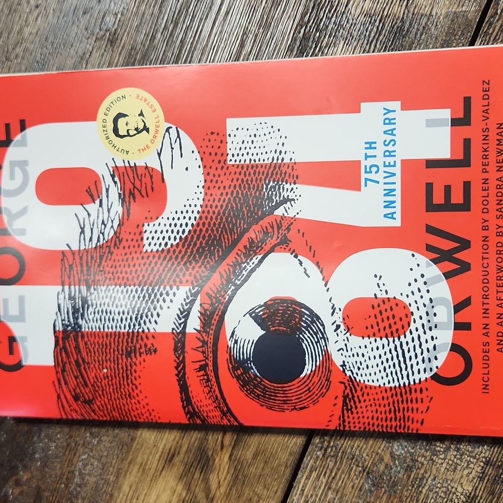"1984" by George Orwell, paperback book, dystopian fiction, political novel